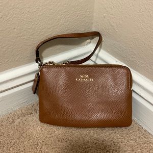 Tan leather coach wristlet
